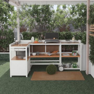 outdoor kitchen set is placed on the grass outside