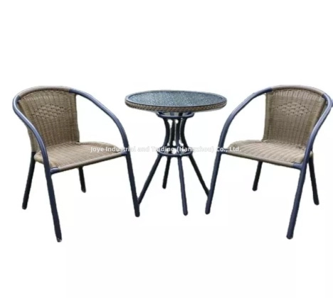 Modern outdoor furniture set with glass table and chairs on balcony